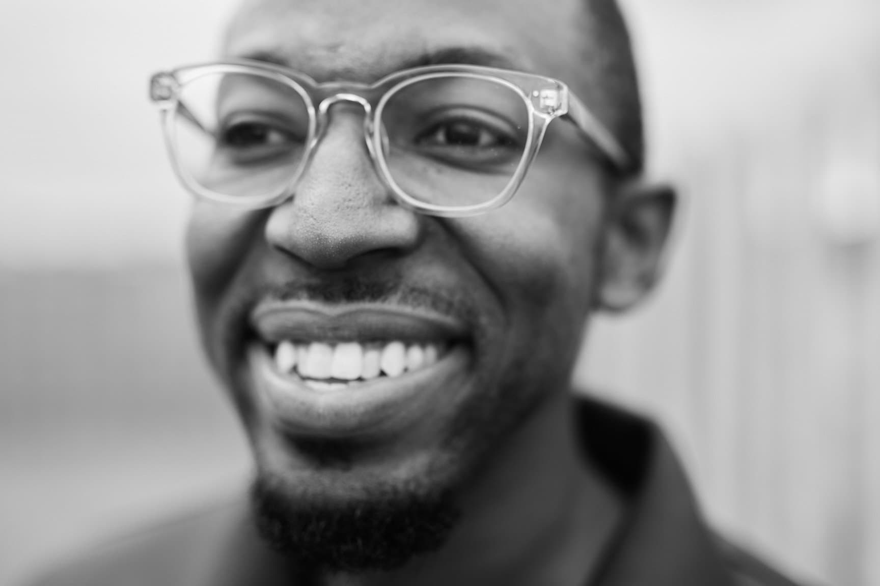 A close up of Andre's smiling face.